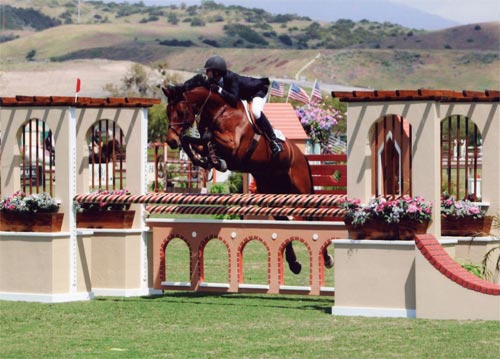 Zoie Nagelhout and Vitoria Champion Modified Junior Amateur Jumper 2011 Blenheim Red White and Blue Classic Photo Flying Horse