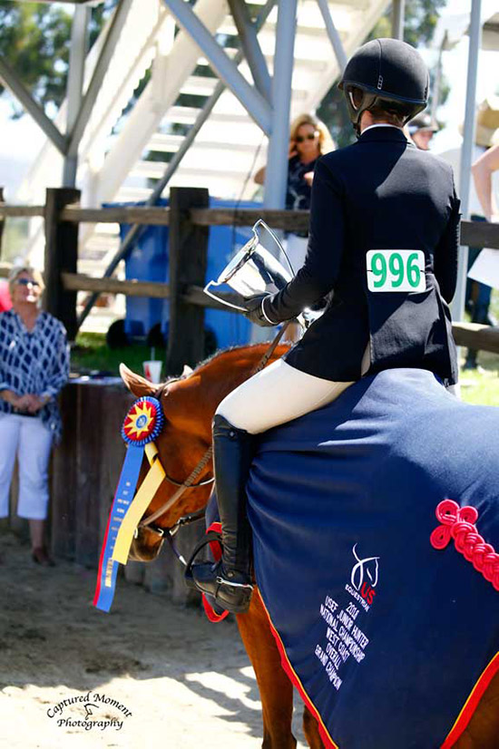 Ava Stearns and Laura Wasserman's Bocelli 2018 Jr. Hunter Finals National Championship-West Grand Champion 3'6" Photo by Captured Moment
