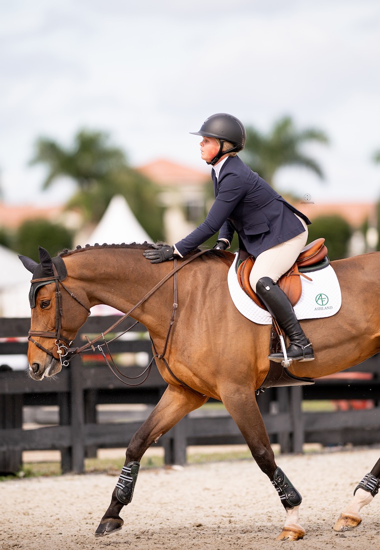 Nikita Jolie, owned by Ashland Farms, with Violet Tatum 2023 Holiday Finale Horse Show 1.15m Junior Jumpers Wellington, FL Photo by Giana Terranova Photography